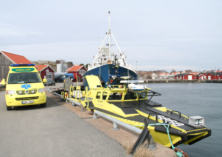 Falck ambulance van and boat